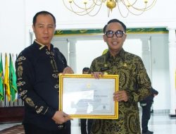 Bupati Way Kanan Terima Penghargaan Penerapan Sistem Merit Kategori BAIK, dari Komisi Aparatur Sipil Negara (KASN)